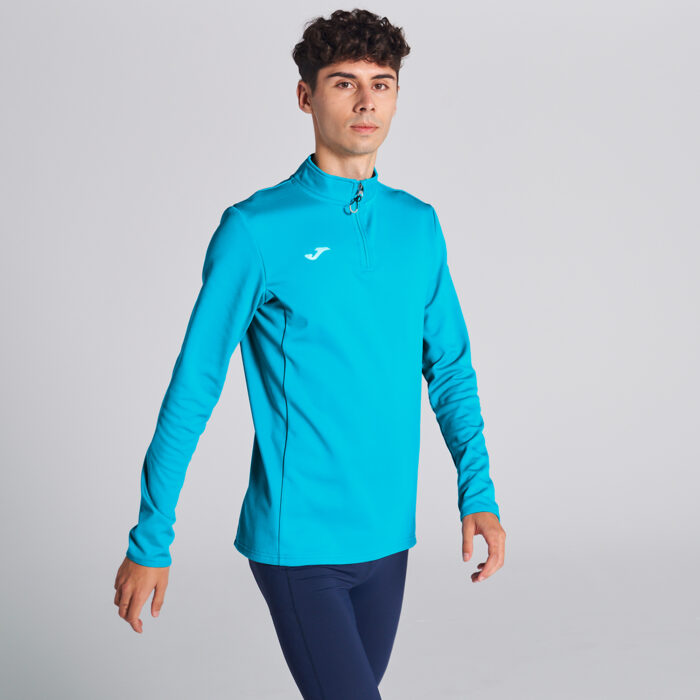 SUDADERA RUNNING NIGHT TURQUESA FLÚOR